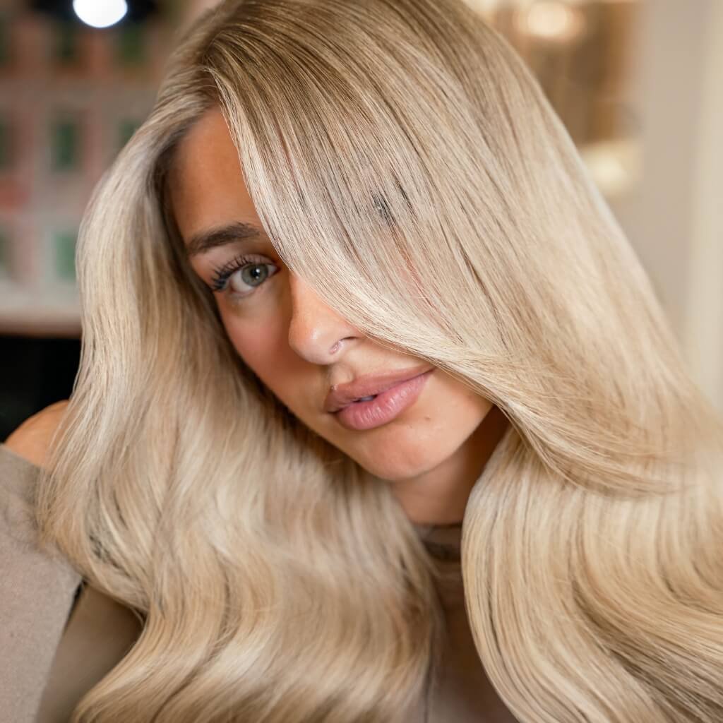 Woman wearing hair extensions in London close up