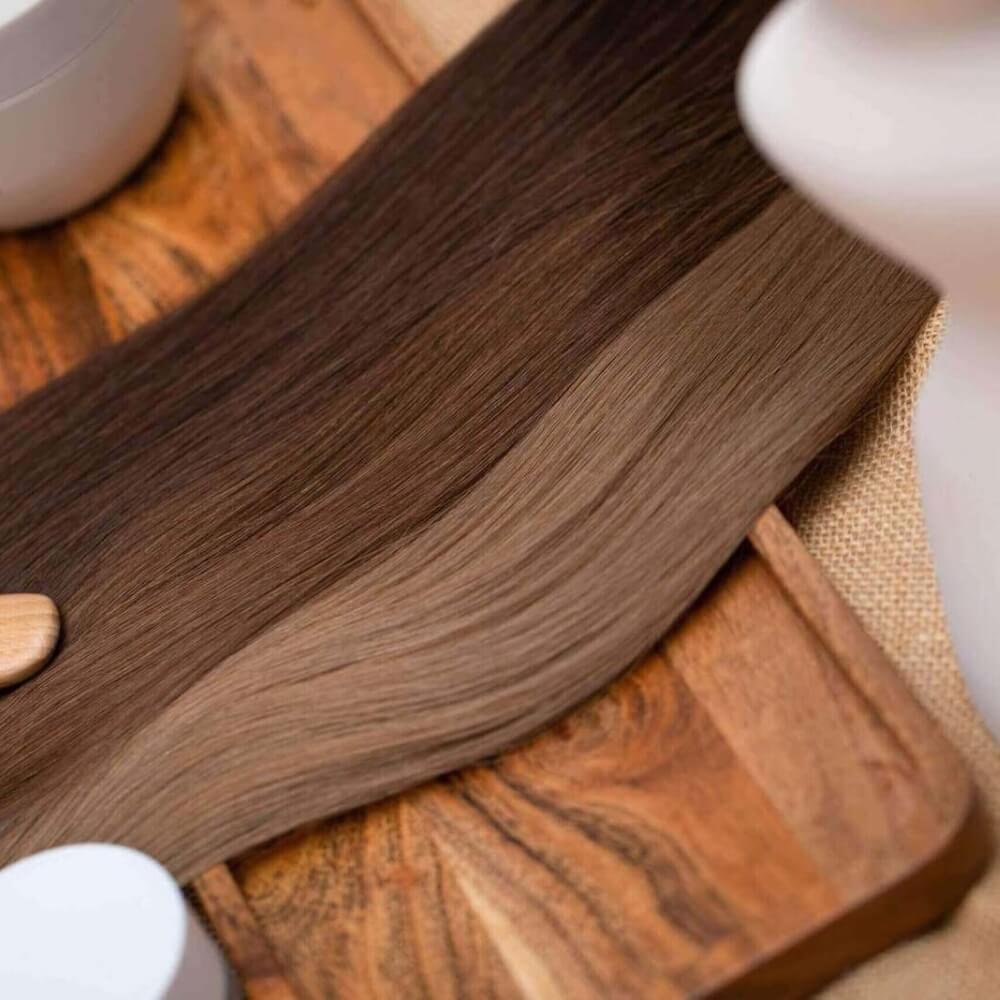 Brown hair extensions laid out